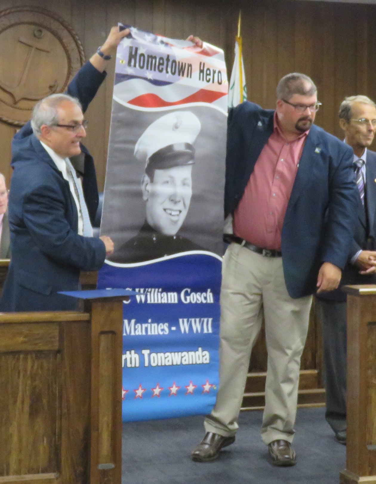 Mayor Arthur Pappas and Alderman Eric Zadzilka unveil veteran William Gosch's Hometown Hero banner. (All photos by David Yarger)
